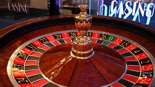 Detail zona taruhan Mega Wheel dengan label pembayaran dan indikator roda berputar